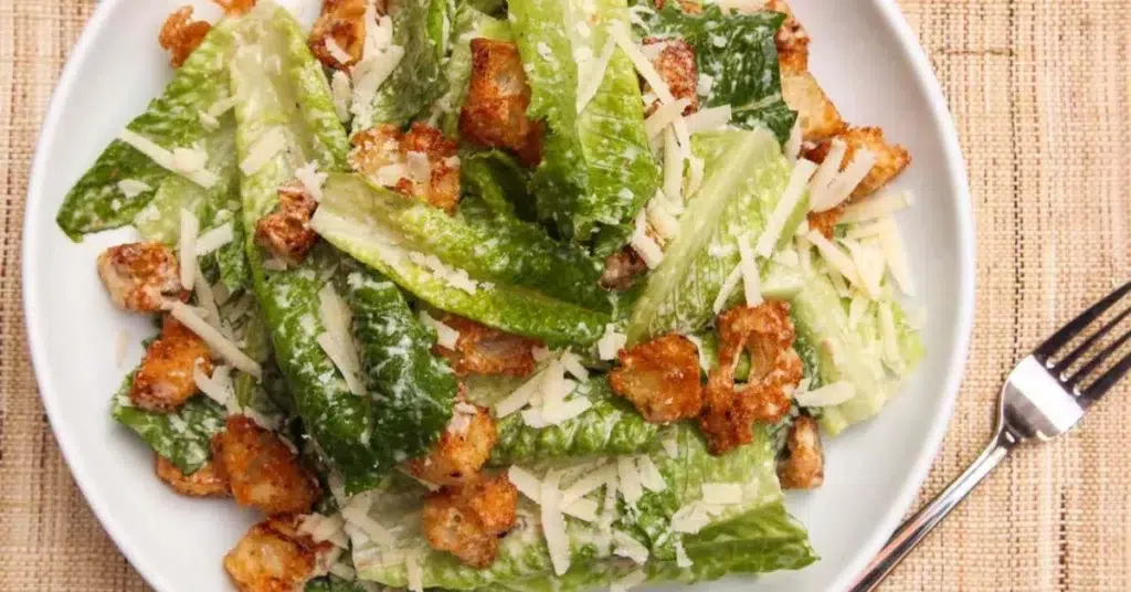A classic Caesar salad made with romaine lettuce, Parmesan cheese, croutons, and Milky Lane Caesar dressing.